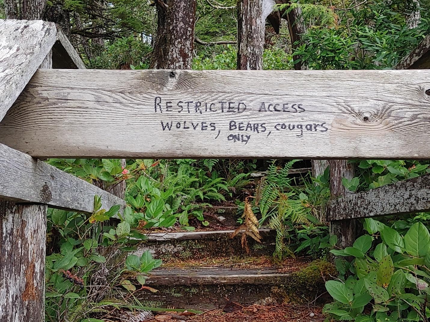 Restricted access sign in a Canadian rain forest